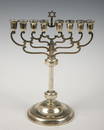 A LARGE SILVER MENORAH