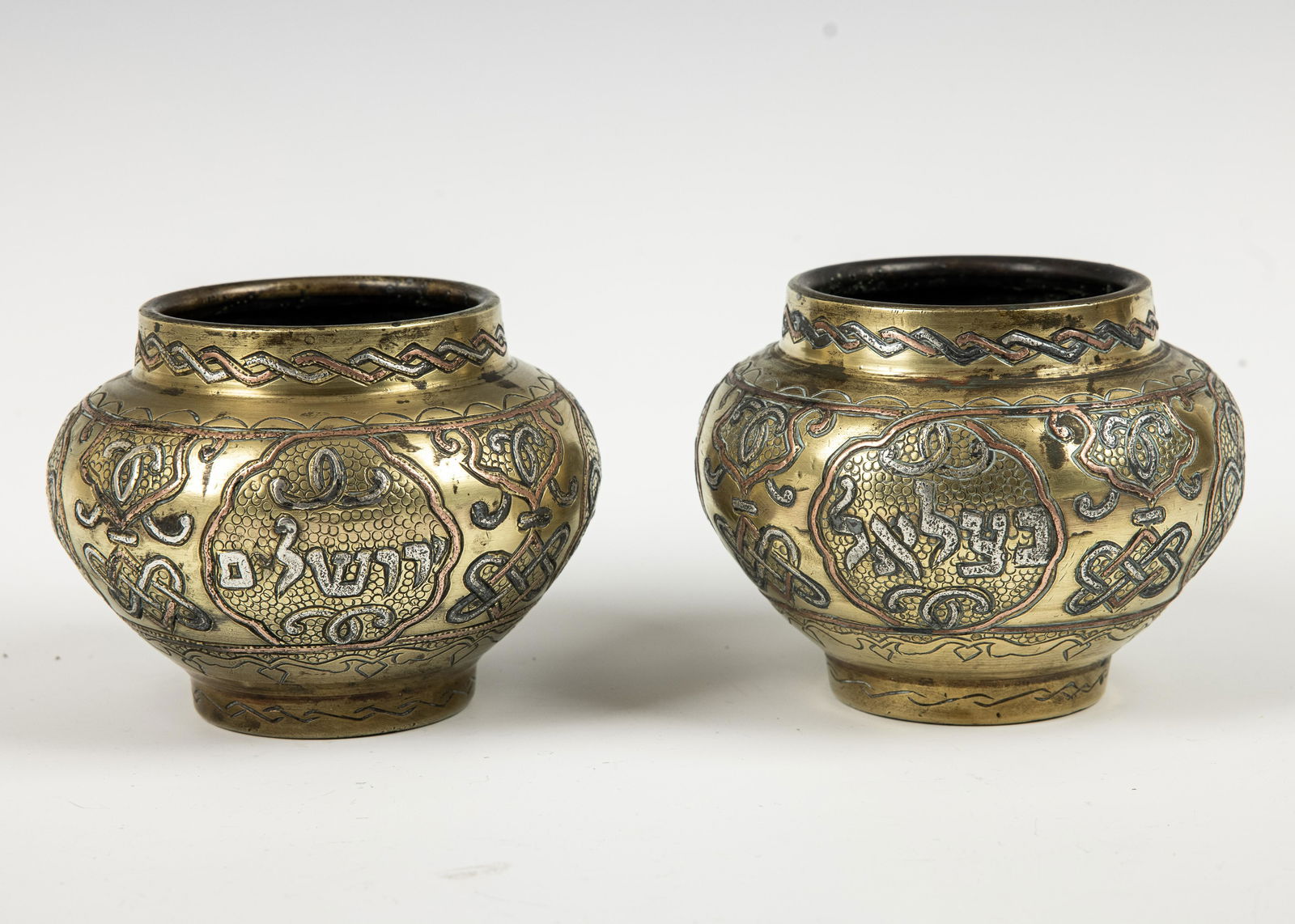 A PAIR OF BRASS DAMASCENE BOWLS (1 of 1)