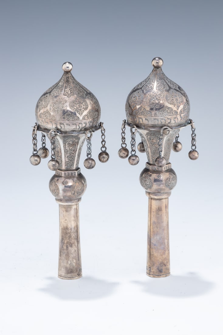A PAIR OF SILVER TORAH FINIALS. Persian, 20th century. Traditional form. Engraved with period (1 of 1)