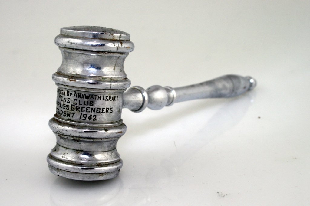 A JUDAIC PRESENTATION GAVEL. United States, c. 19: A JUDAIC PRESENTATION GAVEL. United States, c. 1942. Chrome plating over brass. Engraved “ Presented by Ahavath Israel Men’s Club to Charles Greenberg President 1942". 9” long.
