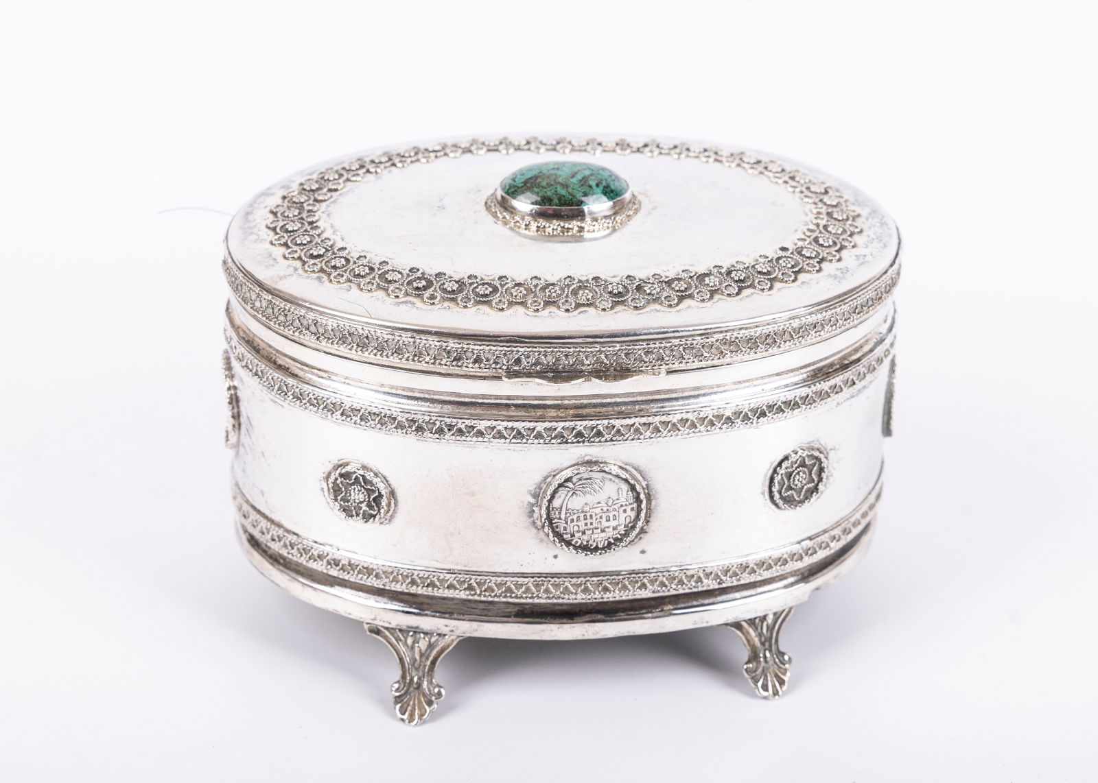 AN EARLY STERLING SILVER ETROG CONTAINER. Israel, c. 1960. Oval form. With applied filigree (1 of 1)