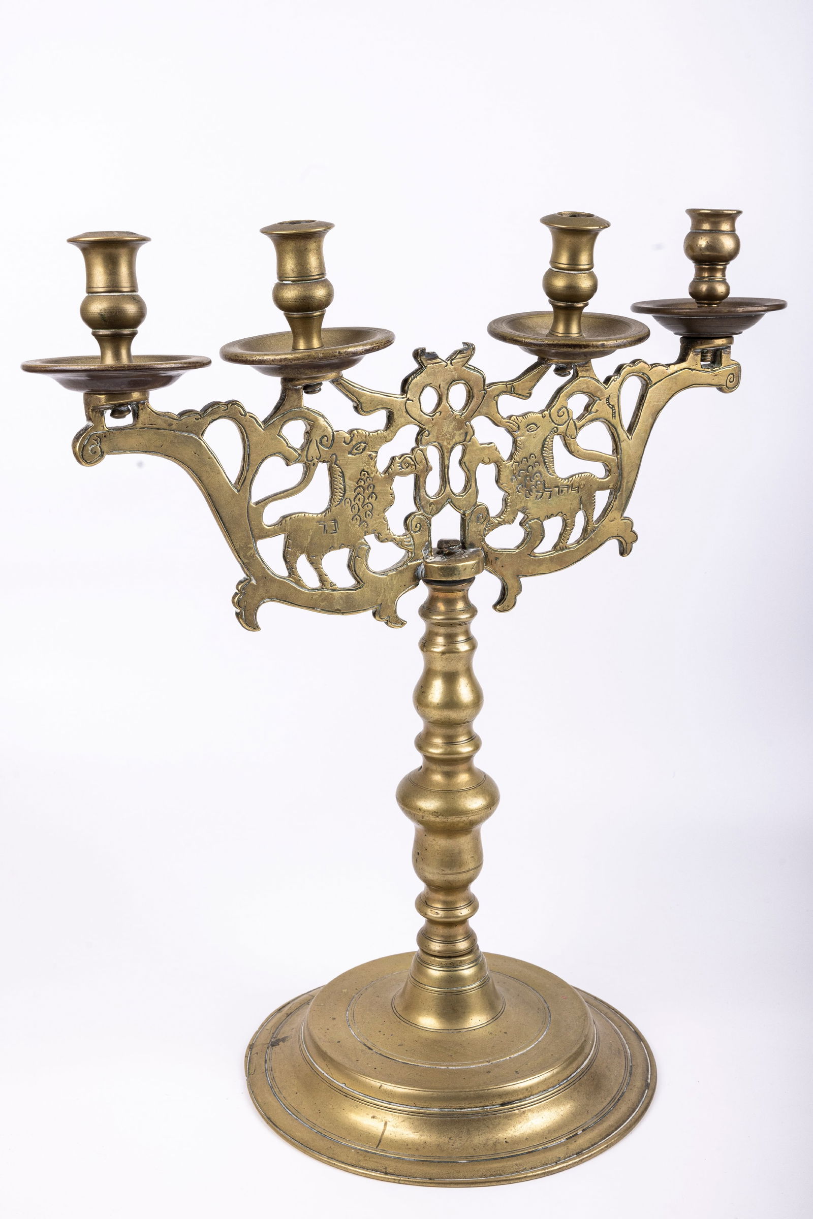 A BRASS SABBATH LAMP. Poland or Ukraine late 18, early 19th century. On a round base in traditional (1 of 1)