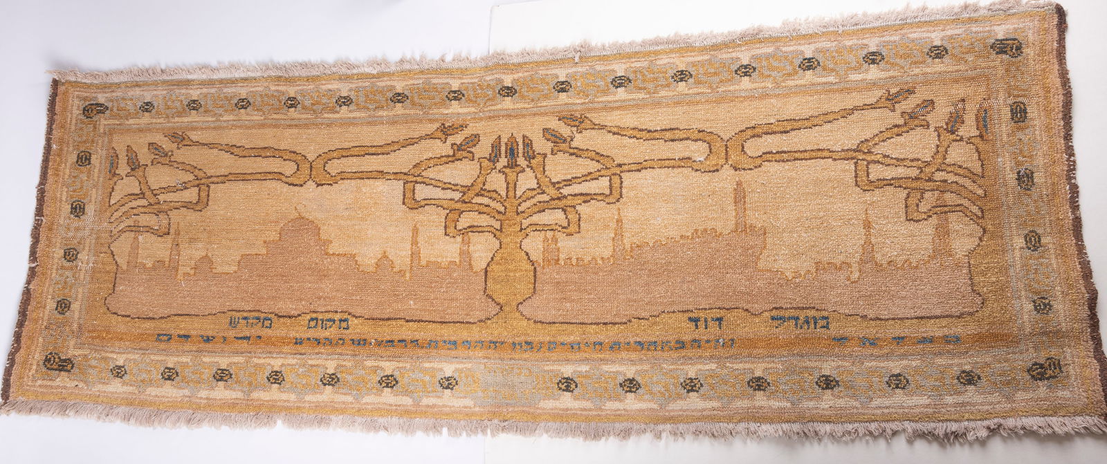 A LARGE BEZALEL STYLE CARPET. 62" x 22". In The style of Bezalel. (1 of 9)