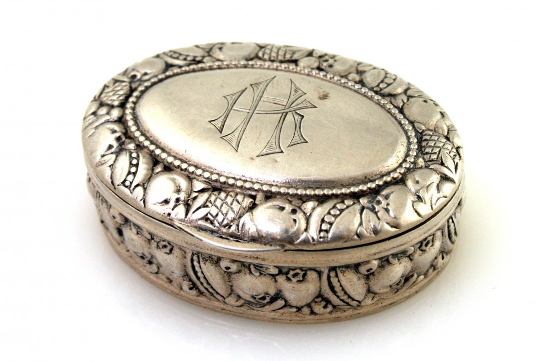 A SILVER PILL BOX. Germany, c.1920.: A SILVER PILL BOX. Germany, c.1920. Oval shaped. Marked. 1.7” wide.