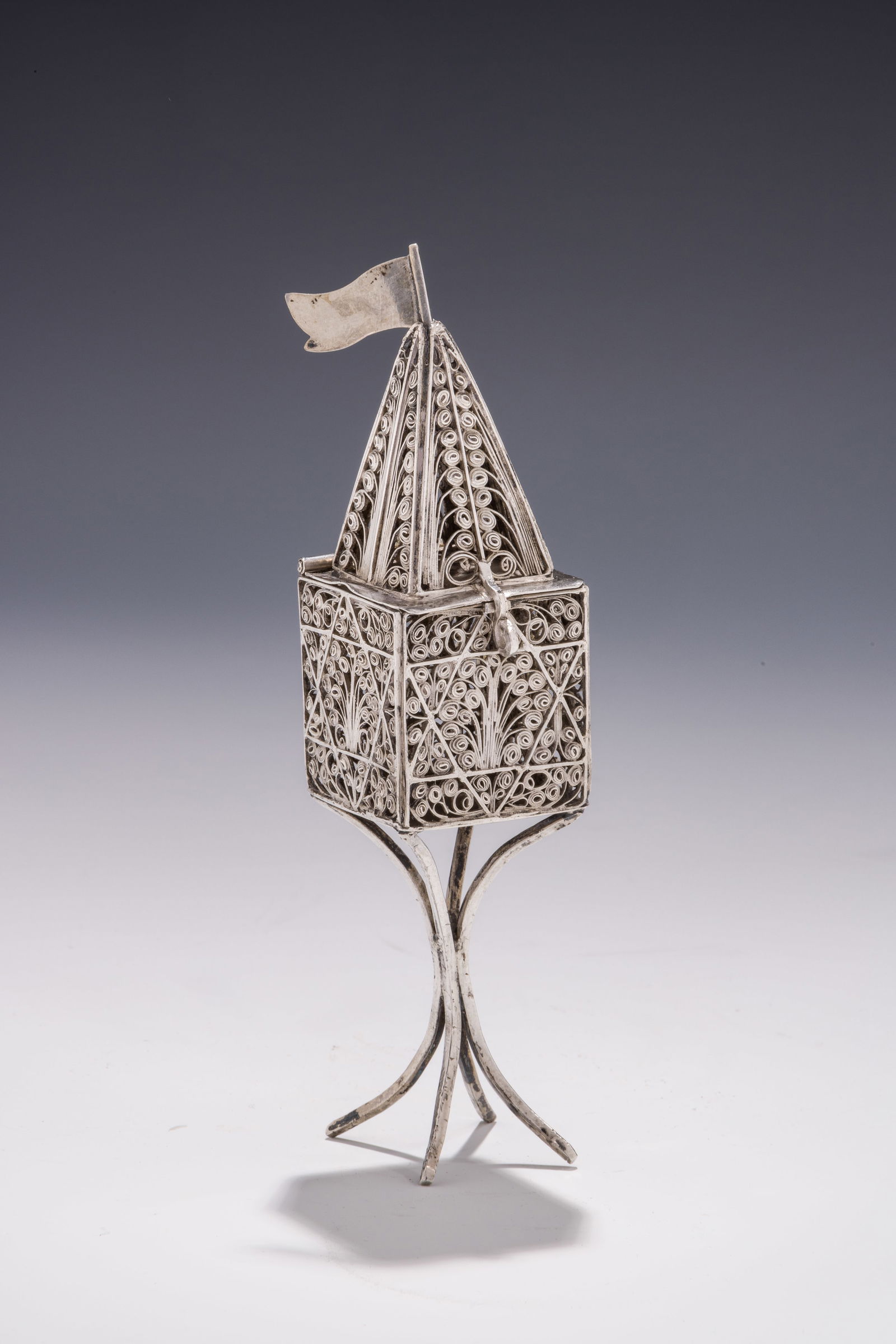 A SILVER SPICE TOWER. Poland or Ukraine, c.1850. On four supportive legs that connect to a square (1 of 1)