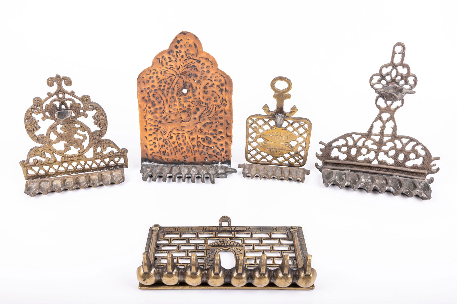 A GROUP OF FIVE BRASS HANUKKAH LAMPS (1 of 1)