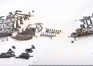 A GROUP OF FIVE BRASS HANUKKAH LAMPS