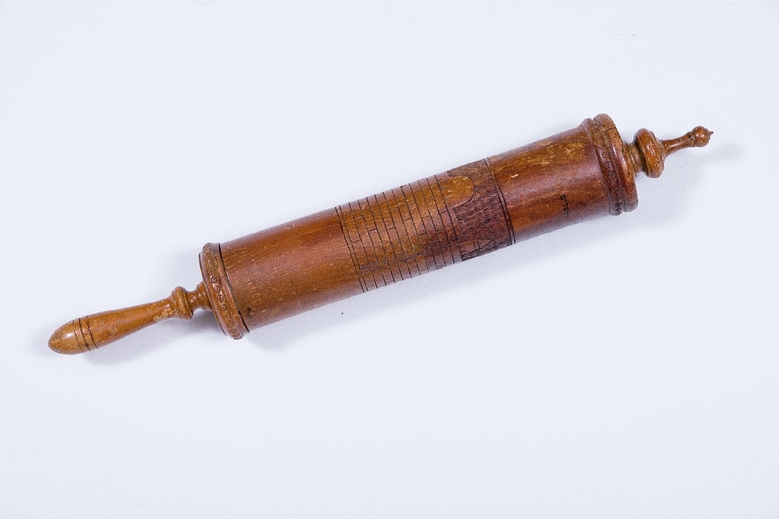 A MONUMENTAL CARVED WOOD MEGILLAH HOLDER WITH ORIGINAL SEPHARD MEGILLAH.  (1 of 2)