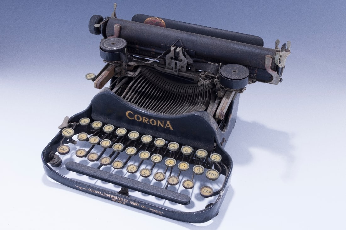 A RARE AND EARLY YIDDISH TYPEWRITER BY THE CORONA COMPANY.  (1 of 3)