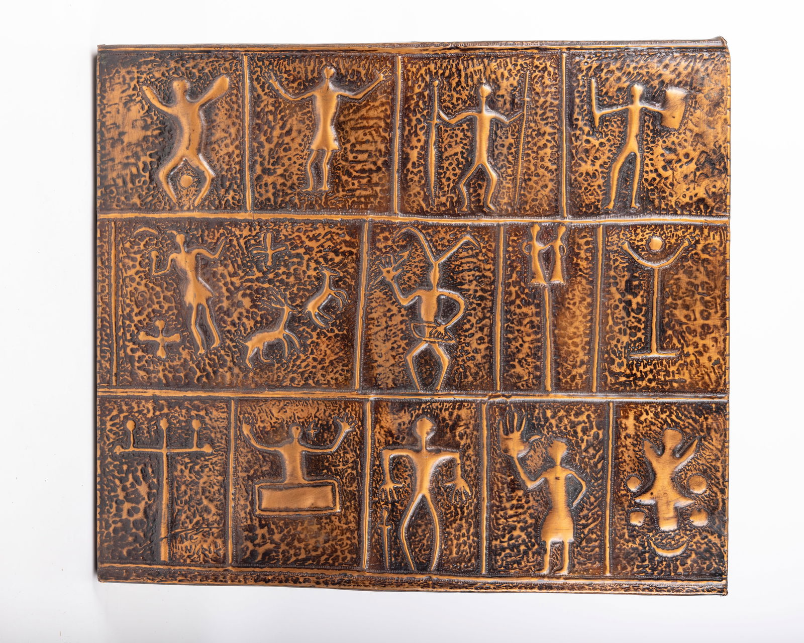 A LARGE COPPER CHASED RELIEF MOUNTED ON WOOD. Sarajevo, c. 1950. (1 of 3)