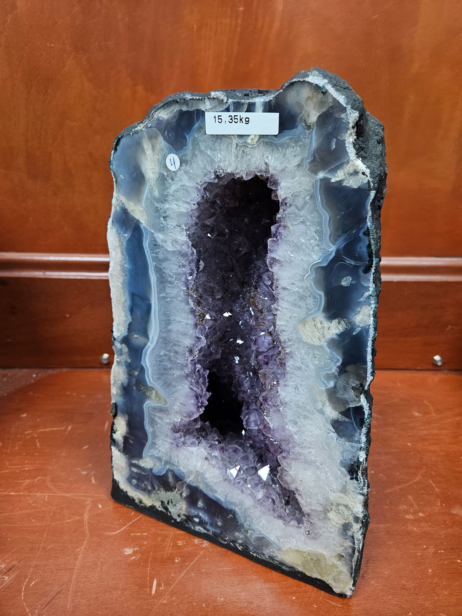 A LARGE AMETHYST GEODE. Polished sides. Excellent purple coloring. 15.35  kg and 13” tall. (1 of 4)