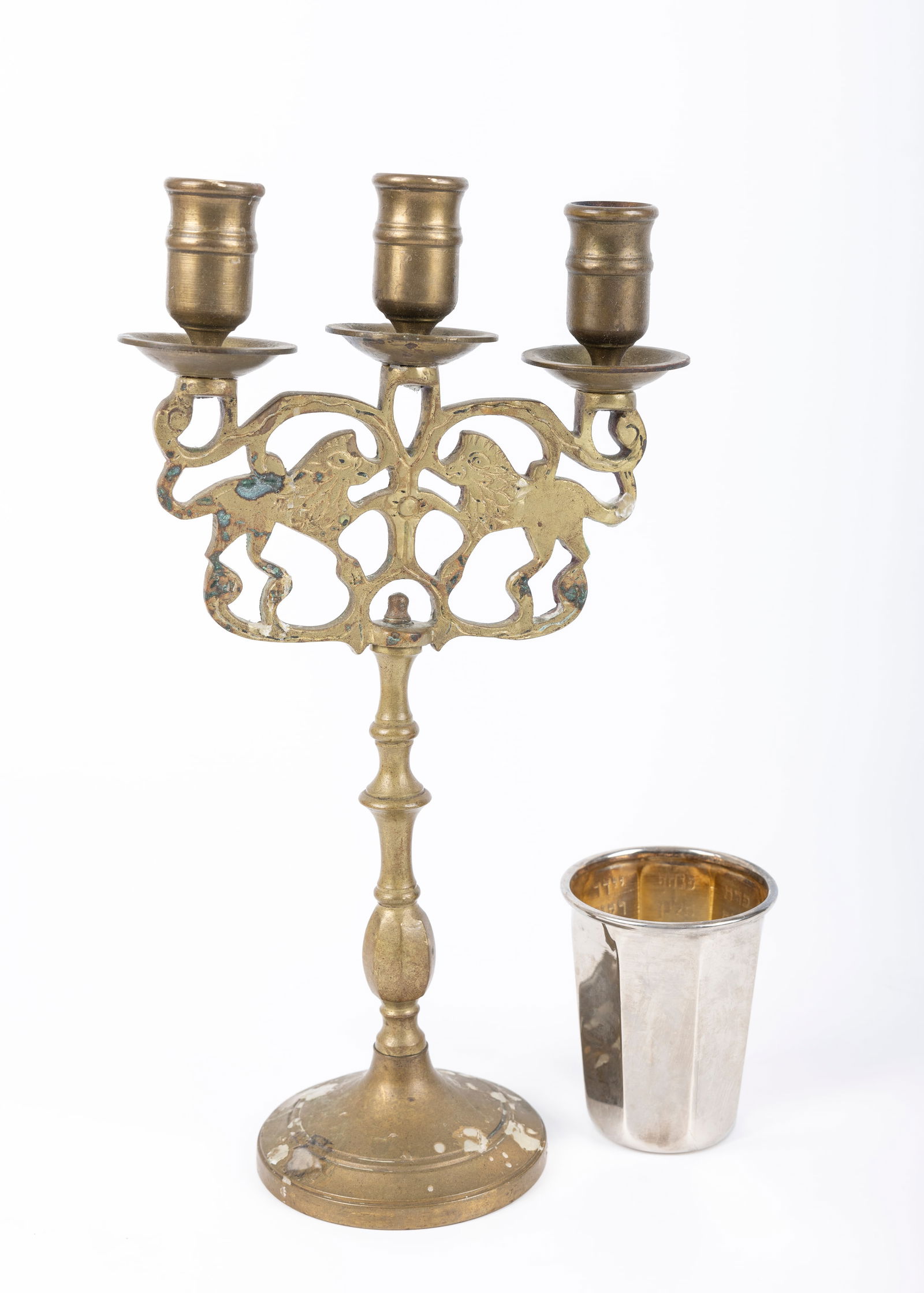 JUDAICA. AN ANTIQUE BRASS SABBATH LAMP AND KIDDUSH CUP. The lamp is 12” tall and the cup is (1 of 1)