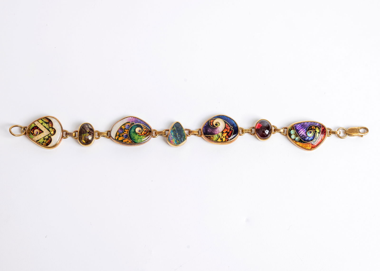 A LADIES 18K - 22K YELLOW GOLD MULTI COLORED ENAMEL LINK BRACELET. The bezel is set with garnet, fir (1 of 8)
