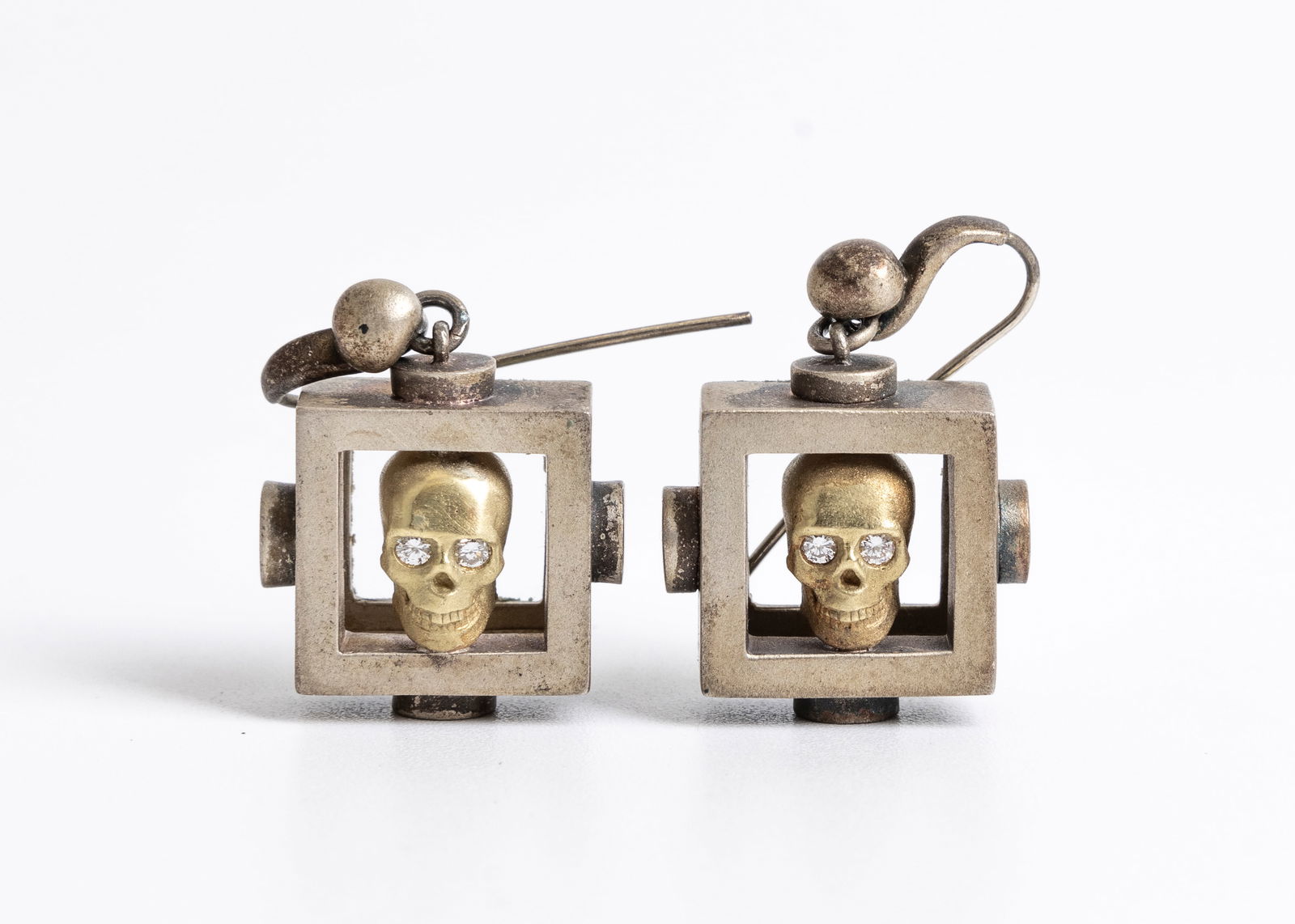 A PAIR OF BARRY KIESELSTEIN-CORD STERLING SILVER AND 18K YELLOW GOLD SKULL EARRINGS WITH DIAMOND EYE (1 of 10)