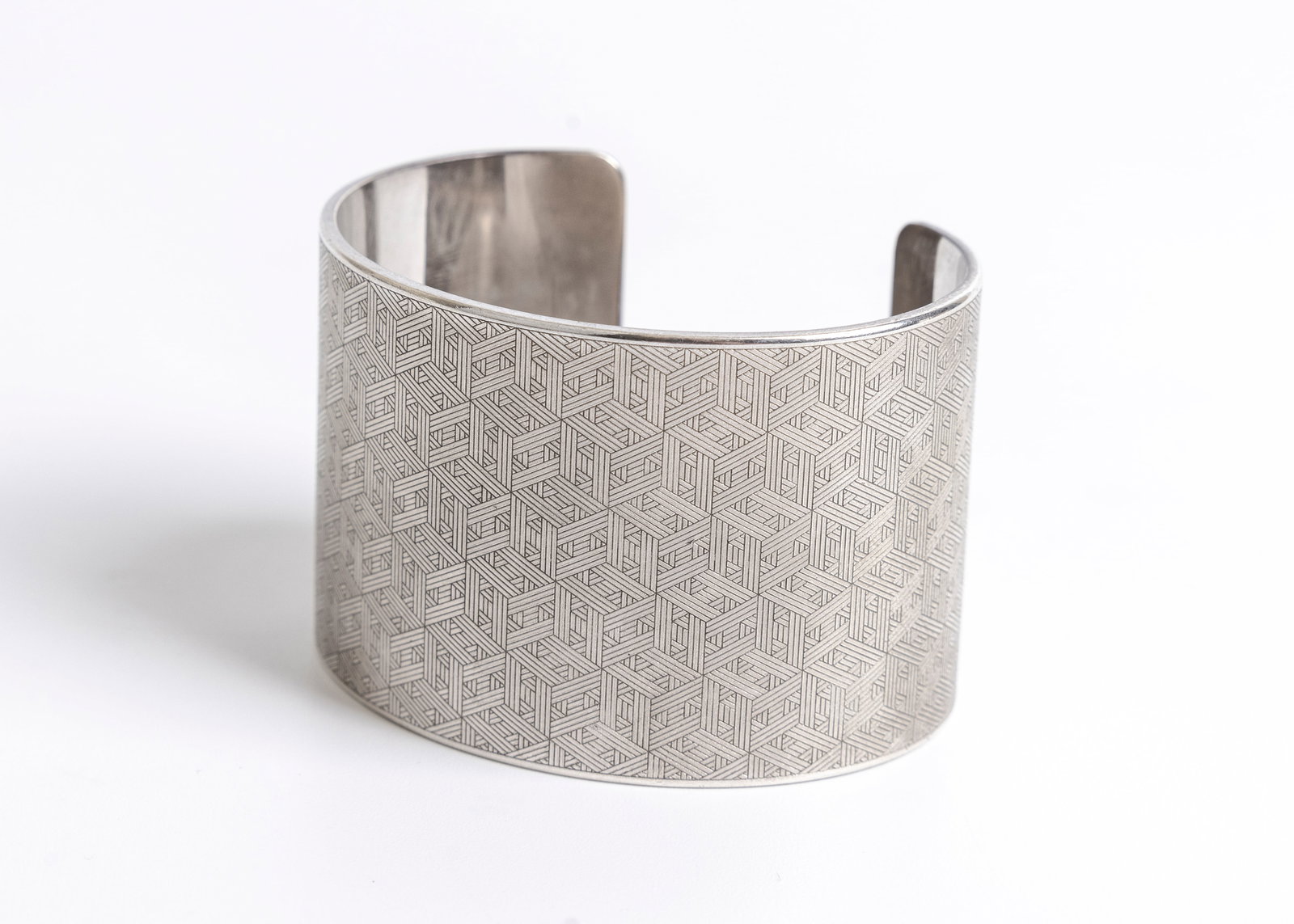 A STERLING SILVER CUFF BRACELET BY HERMES. 41.00mm width. 102 grams. Marked HERMES A.D. Ag 925 LG. E (1 of 10)