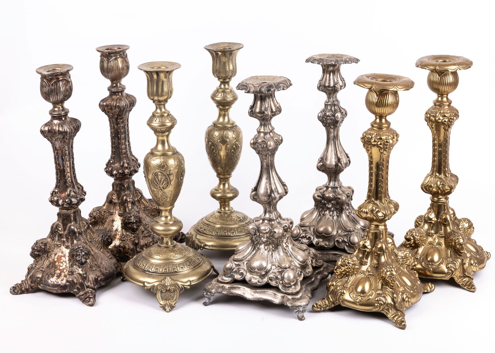 A GROUP OF FOUR PAIRS OF SABBATH CANDLESTICKS. Poland, Late 19th century. Each in traditional form. (1 of 1)