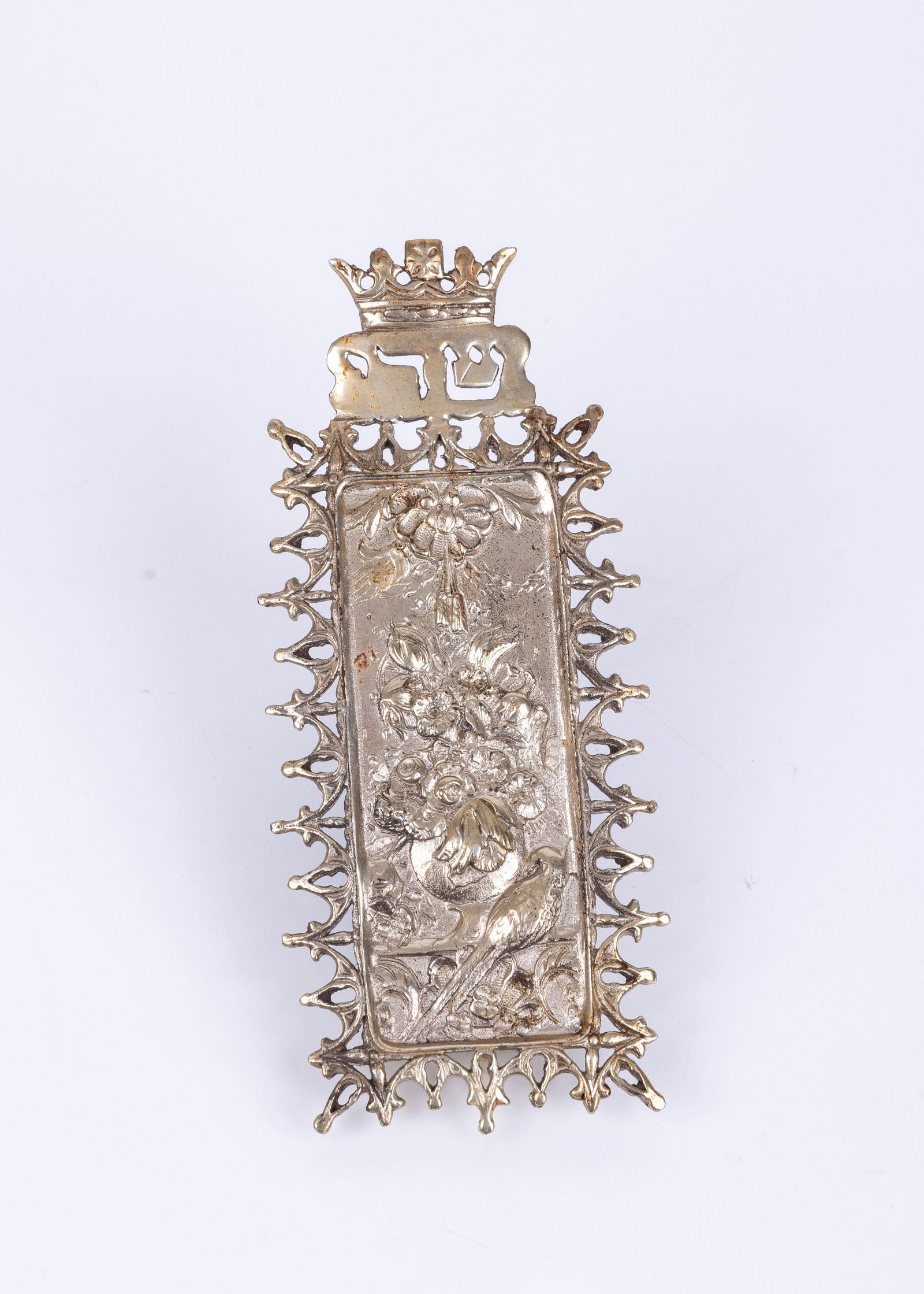 A STERLING SILVER MEZUZAH CASE. American, c. 1970. Decorated with a bowl of flowers and a bird. (1 of 1)