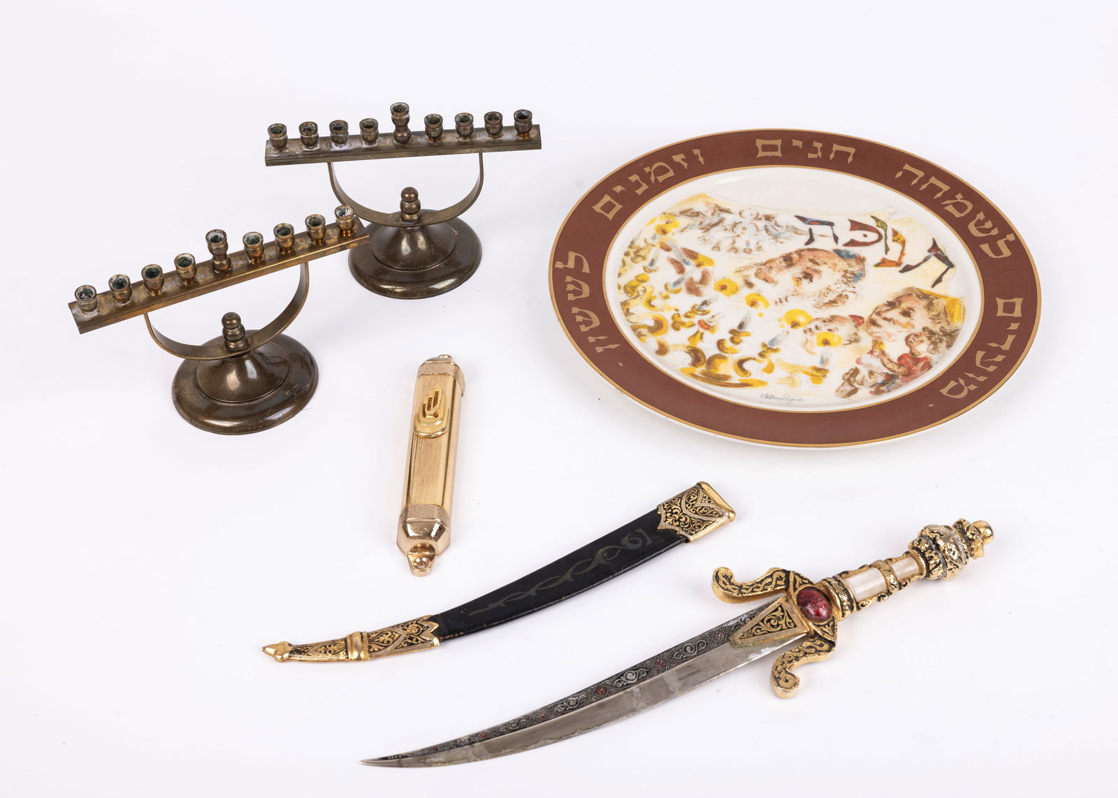 A GROUP OF FIVE JUDAICA OBJECTS. Including two small menorahs, a mezuzah cover, a commemorative (1 of 1)