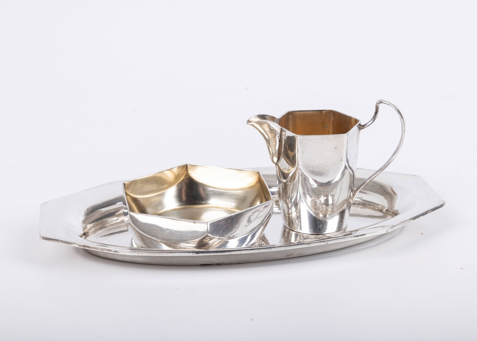 A SILVER SMALL MAYIM ACHRONIM BY POSEN. Frankfurt-au-main, Early 20th century. On an oval tray.: A SILVER SMALL MAYIM ACHRONIM BY POSEN. Frankfurt-au-main, Early 20th century. On an oval tray. With a small pitcher and a basket. 6” long.