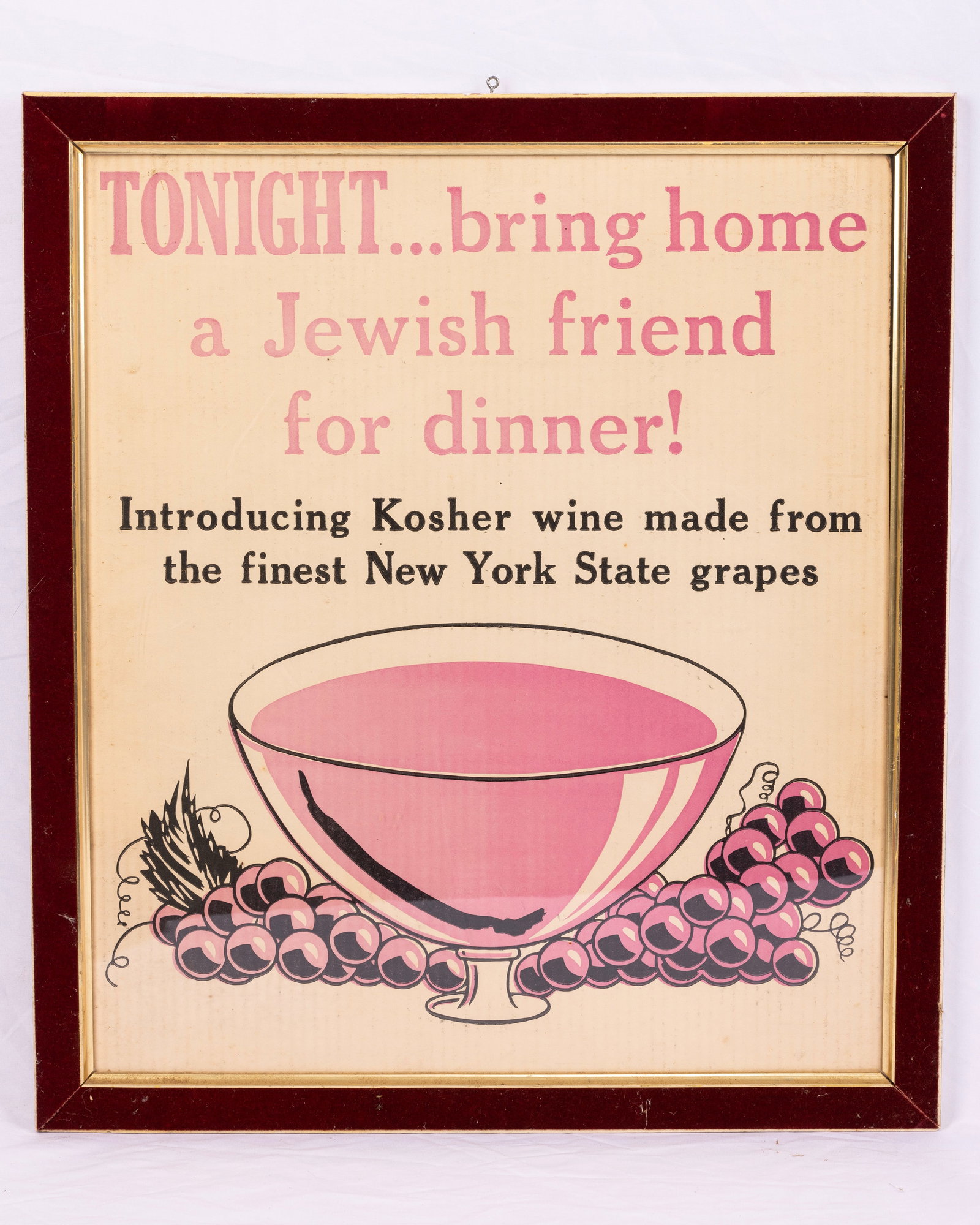 A POSTER PROMOTING KOSHER WINE MADE FROM NEW YORK STATE GRAPES. New York, c. 1930. Promoting: A POSTER PROMOTING KOSHER WINE MADE FROM NEW YORK STATE GRAPES. New York, c. 1930. Promoting bringing home a Jewish friend to share kosher wine with. 20.5” x 10.7”.