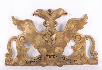 A REPRODUCTION OF A ROUMANIAN ARK TOP. Cast from the original. With a double headed eagle wearing