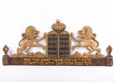 A SET OF SYNAGOGUE LIONS FROM THE TOP OF AN ARON KODESH. American, c. 1920. Two lions flanking a