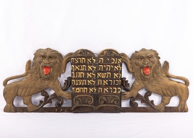 A SET OF SYNAGOGUE LIONS FROM THE TOP OF AN ARON KODESH. American, c. 1920. Two lions flanking a