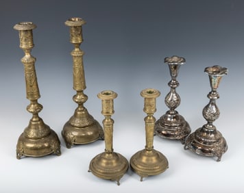A COLLECTION OF THREE PAIRS OF SABBATH CANDLESTICKS. Warsaw, c. 1880. Of various styles and types.