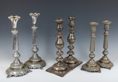 A COLLECTION OF THREE PAIRS OF SABBATH CANDLESTICKS. Warsaw, c. 1880. Of various styles and types.