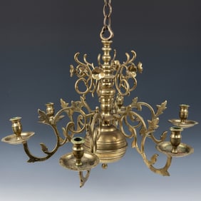 A MONUMENTAL BRASS SYNAGOGUE LAMP. Poland, c. 1800. Early casting with multiple inserts for candles.