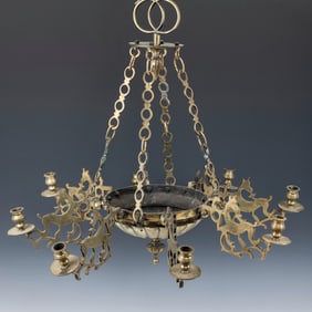 A MONUMENTAL  BRASS SYNAGOGUE LAMP. Poland, c. 1850. Consisting of eight removable candle holders,