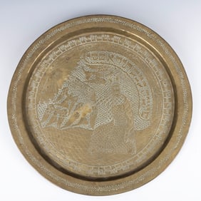 A BRASS JUDAIC PLATE. Probably Syria, 20th century. Depicting Moses. 14?? wide.