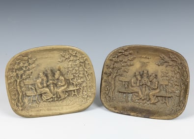TWO JEWISH DECORATIONS. Continental, c. 1900. Each made of cast metal depicting three Jews in