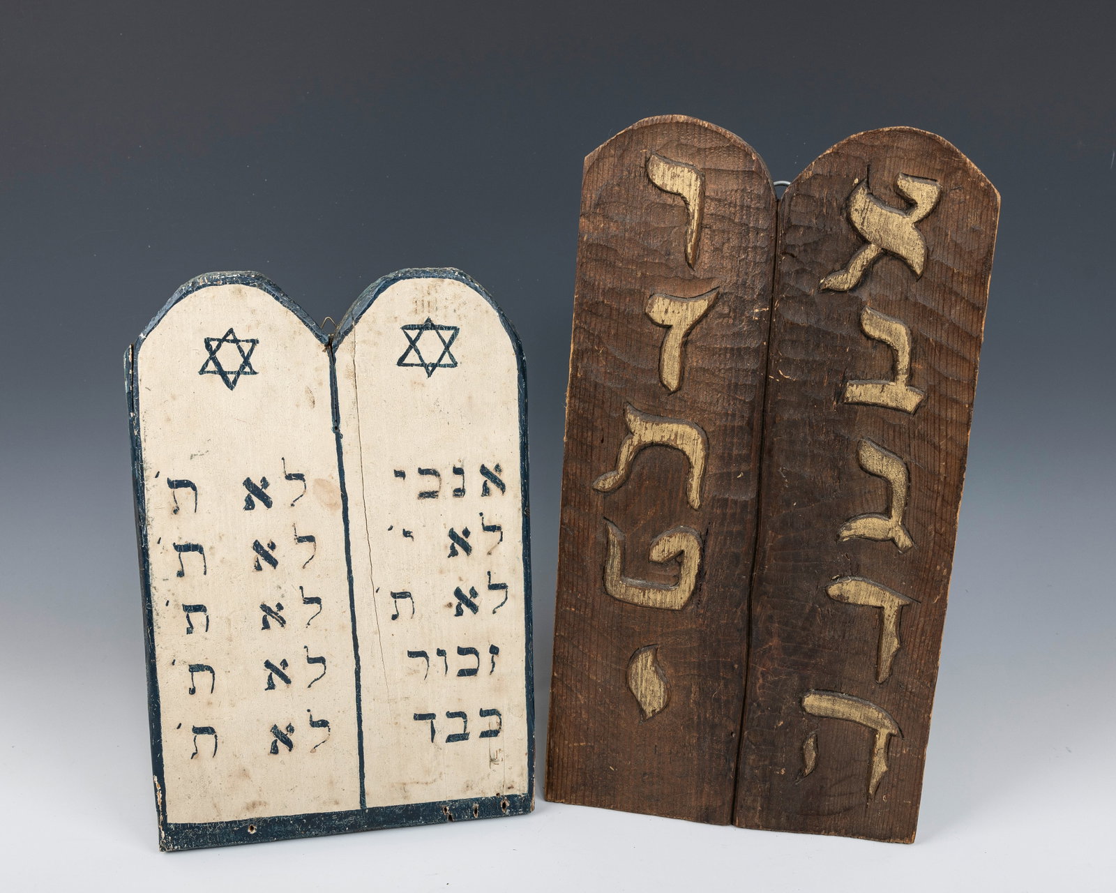 TWO SETS OF WOODEN DECALOGUES. American, c. 1920. One is painted and the other hand carved. 16: TWO SETS OF WOODEN DECALOGUES. American, c. 1920. One is painted and the other hand carved. 16” and 13” tall.