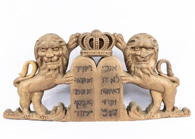 A SET OF SYNAGOGUE LIONS FROM THE TOP OF AN ARON KODESH. American, c. 1920. Two lions flanking a