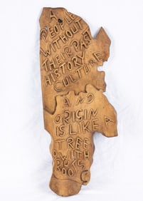 A WOOD CARVING. American, c. 1950.Indicating that a people without their past history, culture and