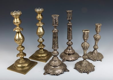 A GROUP OF THREE PAIRS OF SABBATH CANDLESTICKS. Poland, c. 1880. Each of them has a different style.