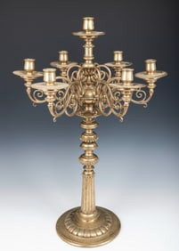 A MASSIVE BRASS CANDELABRA. Poland, c. 1900. Crafted to hold seven lights. Marked. 25?? tall.