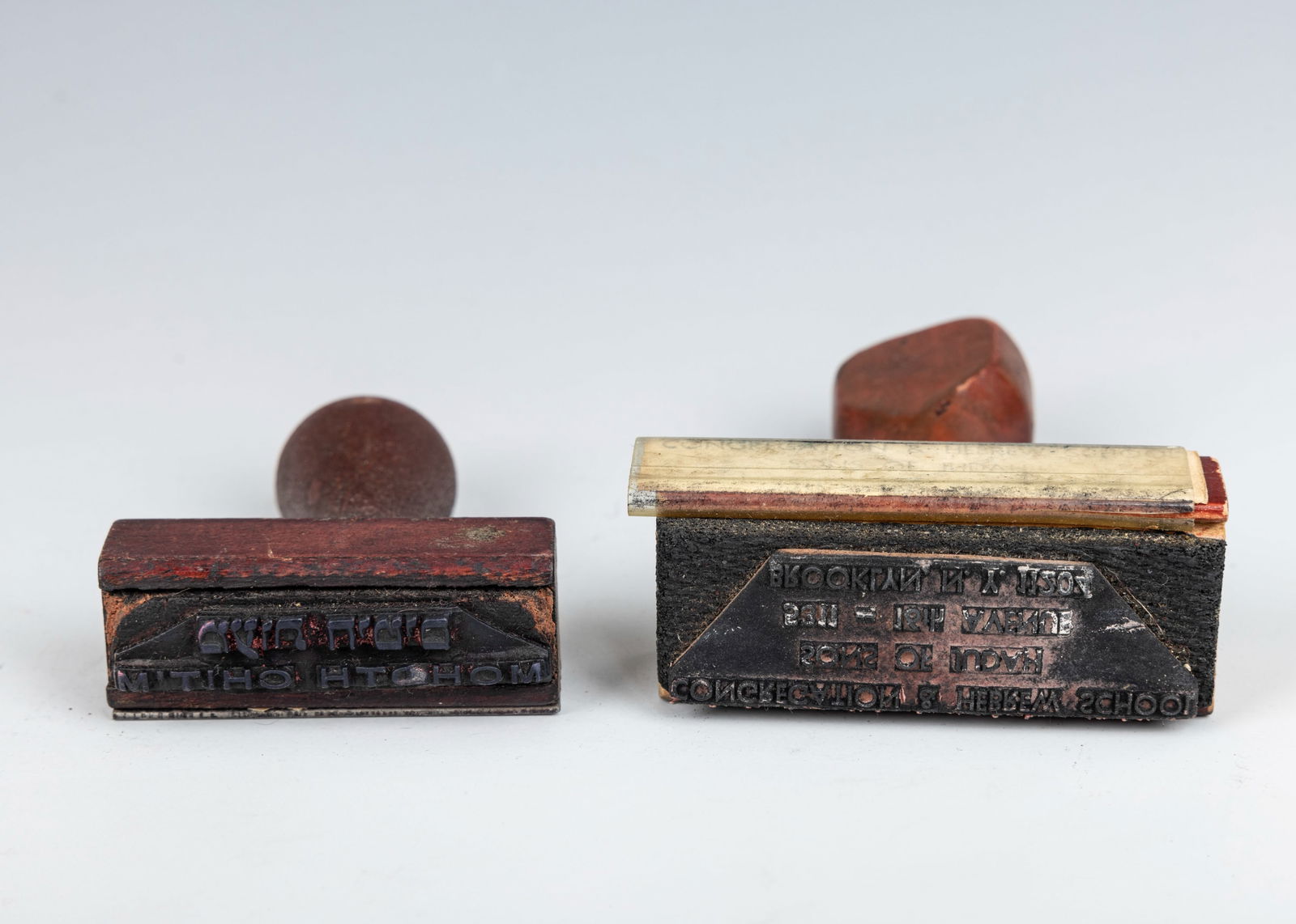 TWO RUBBER STAMPS. One Russian indicating Maaot Chitim and one American from a synagogue. (1 of 1)
