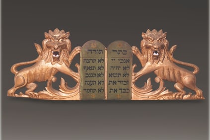 A PAIR OF HAND CARVED WOODEN LIONS FROM AN ARON KODESH. United States, c. 1900.  The lions are