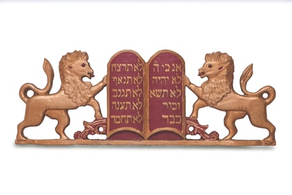 A LARGE PAIR OF HAND CARVED WOODEN LIONS FROM AN ARON KODESH. United States, c. 1900.  The lions are