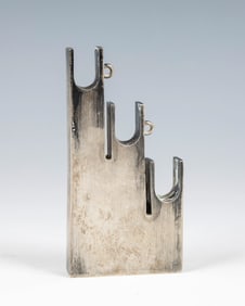 A STERLING SILVER MEZUZAH BY CARMEL SHABI. Israel, c. 1989. Modernist in form. Designed with three U