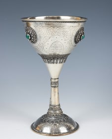 A LARGE STERLING SILVER KIDDUSH GOBLET BY THE BEZALEL SCHOOL. Jerusalem, mid 20th century. On a