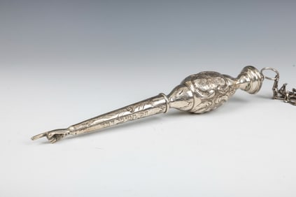 A LARGE SILVER TORAH POINTER. Austro-Hungarian Empire, c. 1900. The upper grip portion is