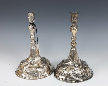 A PAIR OF SILVER CANDLESTICKS BY JOHAN CHIRISTINA JANCK. Breslau, 1761 - 76. Each on a crimped round