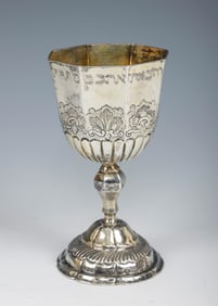 AN SILVER PASSOVER GOBLET BY JOHAN ANDREAS HEUSCHKEL. Nuremberg, 1753-64. On a domed base with a