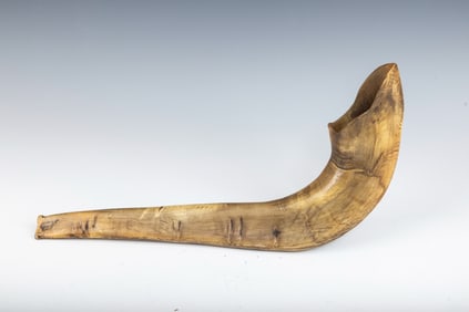 AN ANTIQUE SHOFAR. Germany, c. 1800. Traditional form with carved upper part. 14?? long.