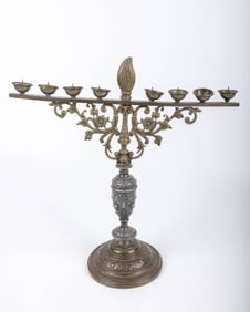A LARGE SILVER PLATED MENORAH. Germany, c 1880 On a round base with spikes for candles 12.8?? tall.