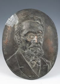 A COPPER WALL PLAQUE IN MEMORY OF MENDELE MOCHER SOFRIM (1836- 1919). Probably Russian, c. 1920. S.