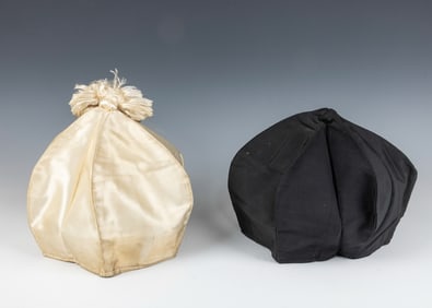 TWO ANTIQUE CANTOR’S HATS. American, c. 1920. One in white for the High Holidays and one in black